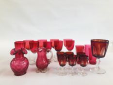 A COLLECTION OF CRANBERRY GLASS INCLUDING SHERRIES, WINES AND JUGS ETC.