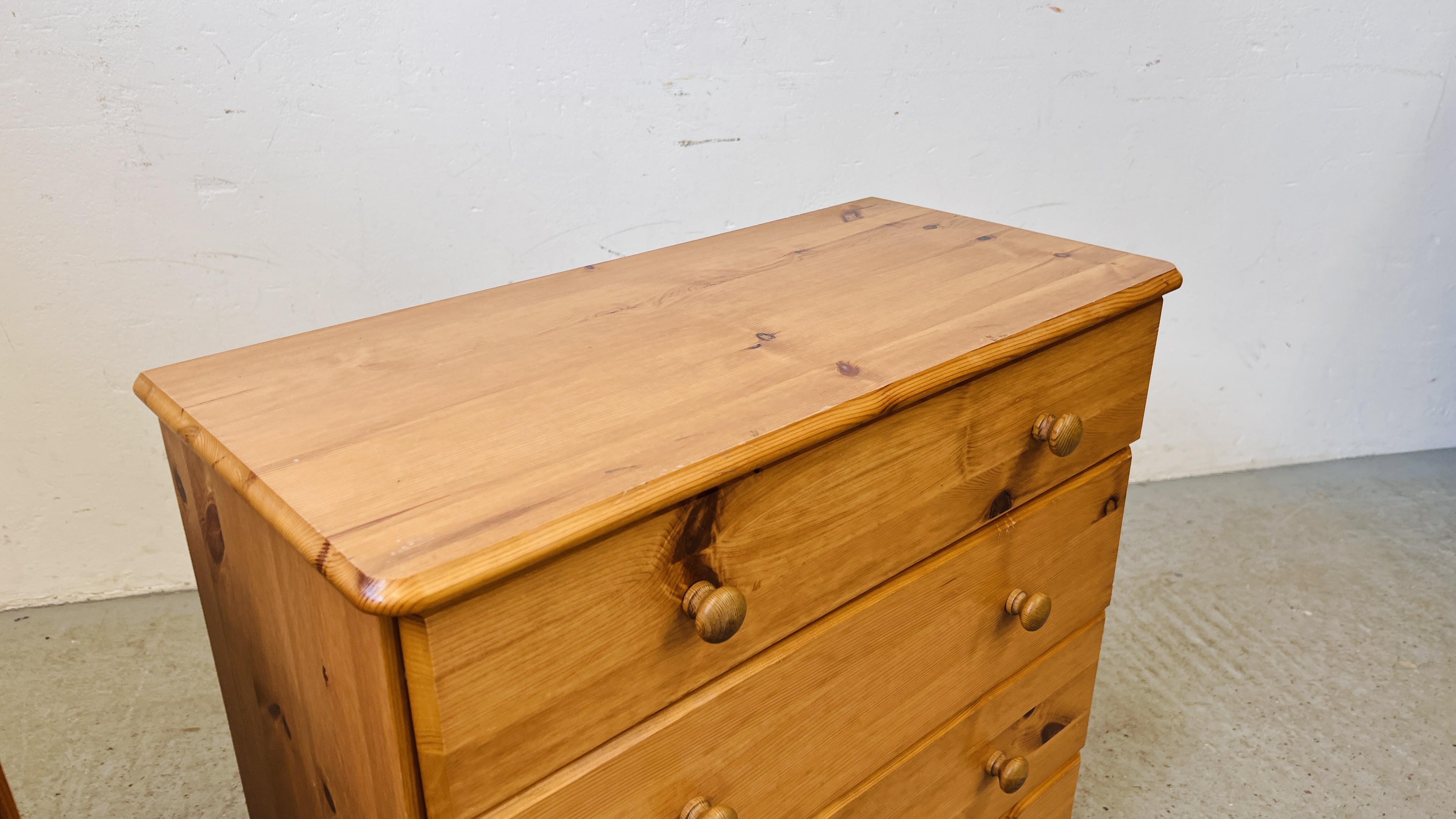 A PAIR OF MODERN HONEY PINE FOUR DRAWER CHESTS - EACH W 71CM D 34CM H 73CM. - Image 3 of 8