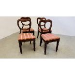 A SET OF FOUR VICTORIAN MAHOGANY SPOON BACK DINING CHAIRS.