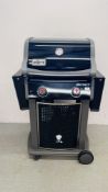 A WEBER SPIRIT GAS BBQ COMPLETE WITH COVER - SOLD AS SEEN.