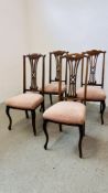 A SET OF 4 VINTAGE MAHOGANY FRAMED STRING BACK DINING CHAIRS.