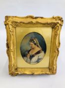 A GILT FRAMED C19TH WATERCOLOUR OF LADY 14CM W X 18.5CM H.