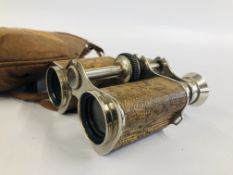 A PAIR OF VINTAGE SNAKESKIN BINOCULARS MARKED "PRISMA" PARIS.