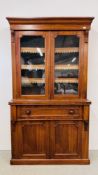 A VICTORIAN WALNUT TWO DOOR BOOKCASE WITH SECRETAIRE DRAWER AND CUPBOARD BELOW W 120CM D 43CM H