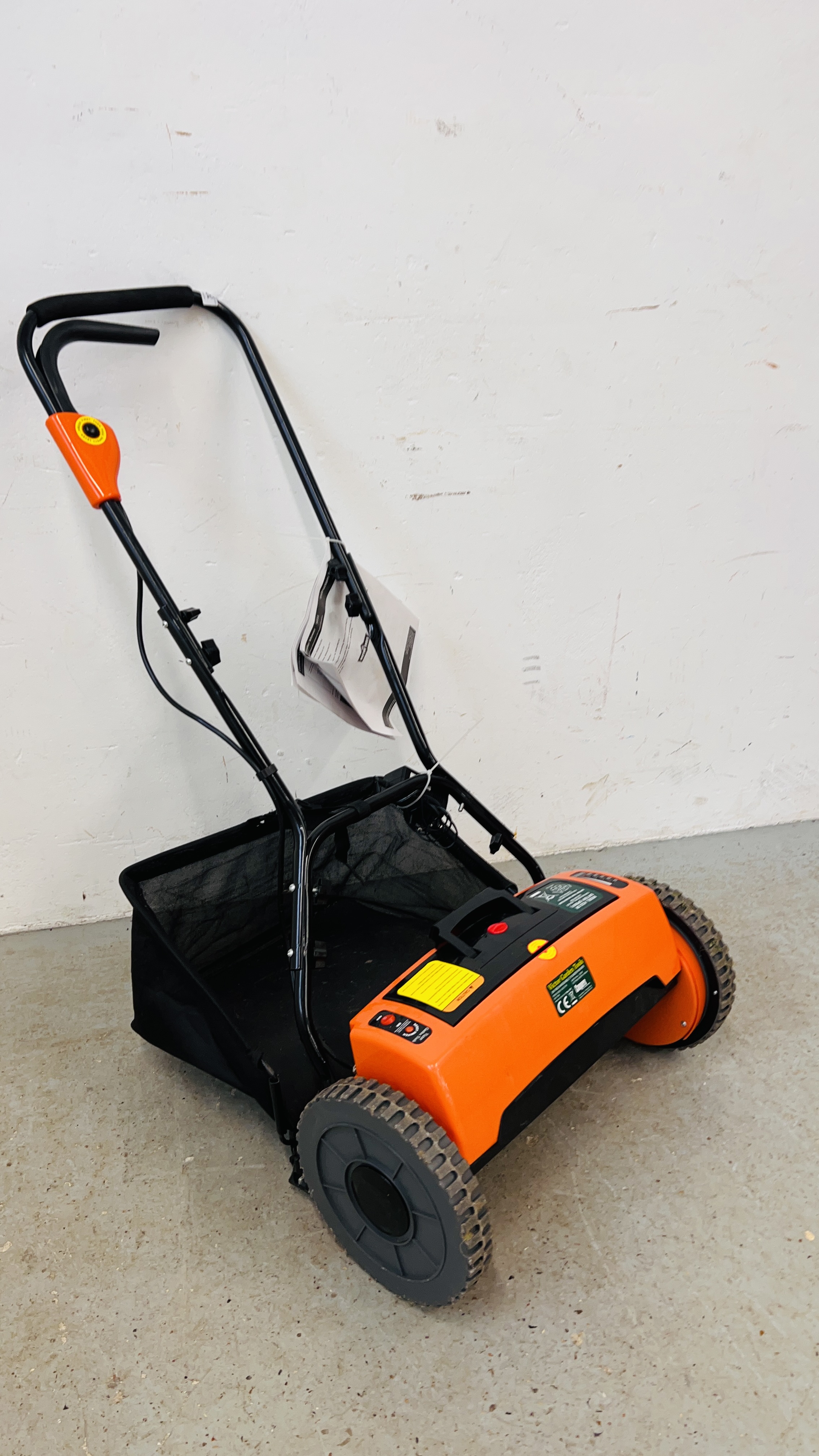 A VICTOR GARDEN TOOLS 24 VOLT RECHARGEABLE CYLINDER MOWER COMPLETE WITH CHARGER AND MANUAL. - Image 2 of 6