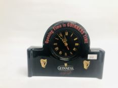 A CERAMIC GUINNESS ADVERTISING CLOCK "OPENING TIME IS GUINNESS TIME" BY DIAMOND PRINT AND CERAMICS.