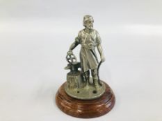 A VULCAN BLACKSMITH CAR MASCOT MOUNTED ON PLINTH 14CM H.