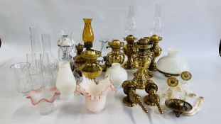 A GROUP OF 6 BRASS OIL LAMP BASES AND 2 BOXES OF OIL LAMP SHADES, FUNNELS AND OIL LAMPS ETC.