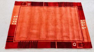 A MODERN DESIGNER ARENA RED RUG, 160CM X 230CM.