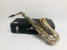 A BRASS SAXOPHONE MARKED "EARLHAM" IN A FITTED HARD CASE.