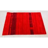 A MODERN CROSSLEY STAIN RESISTANT METROPOLITAN RED STRIPE RUG, 150CM X 240CM.