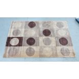 A MODERN DESIGNER CROSSLEY NATURAL CIRCLES RUG, 150CM X 240CM.