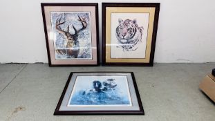 A GROUP OF THREE FRAMED AND MOUNTED FRANKLIN MINT PRINTS TO INCLUDE THE UNTAMED BY CHUCK DEHANN,