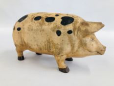 A LARGE REPRODUCTION CAST IRON PIGGY BANK / MONEY BANK - H23CM X W 16CM X L 45CM.