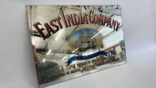 AN UNFRAMED "EAST INDIA COMPANY" ADVERTISING MIRROR, W 79CM X H 53CM.