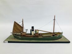 A MOUNTED MODEL OF A HAND BUILT FISHING TRAWLER LYDIA EVA - LENGTH 75CM.