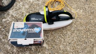 A GARDEN GROOM PRO ELECTRIC HEDGE TRIMMER ALONG WITH A SHOWER MATE SHOWER PUMP - SOLD AS SEEN.