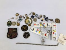 A BOX OF VINTAGE ENAMELED AND CLOTH BADGES AND 3 ROLEX SPOONS.