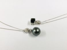 AN ELEGANT 9CT WHITE GOLD PENDANT NECKLACE SET WITH DIAMONDS AND A SINGLE GREY PEARL IN A DROP