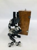 A VINTAGE ERNST LEITZ WETZLAR MICROSCOPE COMPLETE WITH ADDITIONAL LENSES.