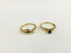 TWO 9CT GOLD RINGS TO INCLUDE AN EXAMPLE SET WITH A CENTRAL PURPLE STONE.