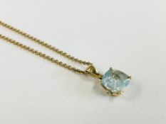 AN UNUSUAL AQUAMARINE PENDANT MARKED 375 10K 28/50 BEARING INDISTINCT MAKERS MARK SUSPENDED ON A