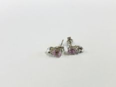 A PAIR OF DIAMOND AND QUARTZ STUD EARRINGS MARKED 750.
