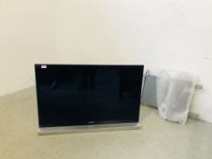 SONY 42 INCH TELEVISION COMPLETE WITH REMOTE, INSTRUCTIONS + HEAVY DUTY WALL BRACKET - SOLD AS SEEN.