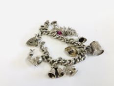 VINTAGE 925 SILVER GATE BRACELET WITH 10 CHARMS ATTACHED.