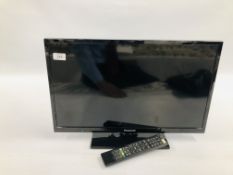 A PANASONIC 24" FLAT SCREEN TV MODEL TX-24C300B WITH REMOTE - SOLD AS SEEN.