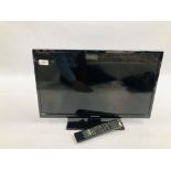 A PANASONIC 24" FLAT SCREEN TV MODEL TX-24C300B WITH REMOTE - SOLD AS SEEN.