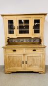 AN EASTERN EUROPEAN PINE DRESSER W 143CM D 58CM H 198CM.