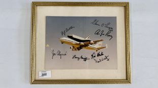 A FRAMED PHOTOGRAPH OF NASA SPACE SHUTTLE VISITING STANSTED AIRPORT 5TH - 7TH JUNE 1983 SIGNED BY