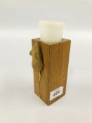 AN OAK CANDLE HOLDER WITH APPLIED MOUSE DESIGN, HEIGHT 12.5CM.