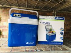 A BOXED OUTWELL ELECTRIC 24 LITRE 12 VOLT / 230 VOLT ELECTRIC COOL BOX - SOLD AS SEEN.