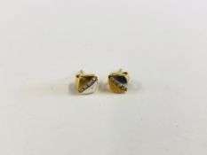 18K WHITE AND YELLOW GOLD STUD EARRINGS SET WITH 3 SMALLER DIAMONDS.