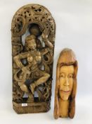 AN ETHNIC HARDWOOD CARVING DEPICTING A FERTILITY GOD H 76CM. W 30CM + ONE OTHER.