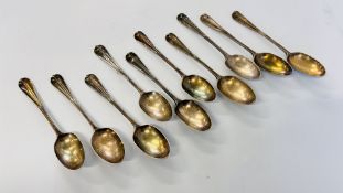 A SET OF 10 SILVER TEASPOONS BY D & J WELBY, LONDON 1892.