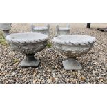 A PAIR OF LARGE CLASSICAL BOWL SHAPED PEDESTAL STONEWORK PLANTERS WITH RELIEF SHELL AND FOLIAGE