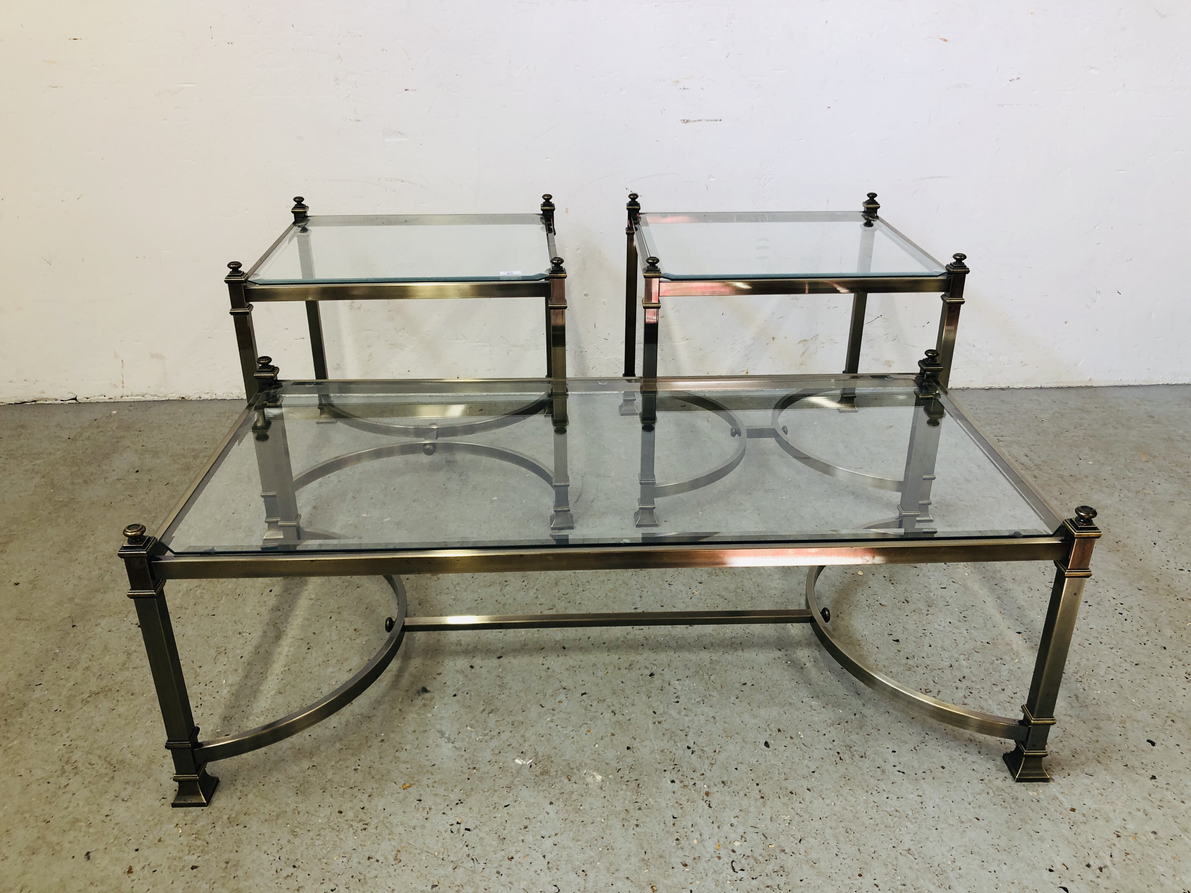 A PAIR OF MODERN DESIGNER METAL CRAFT LAMP / OCCASIONAL TABLES WITH GLASS INSERTS W 55.5CM X D 55.