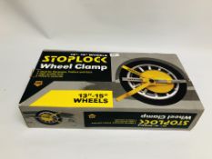 STOP-LOCK 13 INCH - 15 INCH WHEEL CLAMP IN ORIGINAL BOX COMPLETE WITH 2 KEYS.