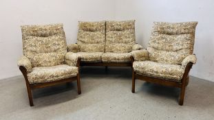AN ERCOL WINDSOR THREE PIECE SUITE COMPRISING OF TWO SEATER SOFA AND TWO ARM CHAIRS,