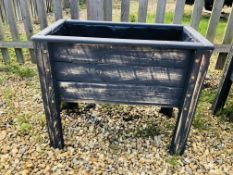 A RECLAIMED WOODEN RAISED TROUGH PLANTER FINISHED IN GREY 79CM W X 45CM D X 61CM H.