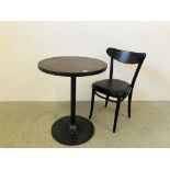 A HEAVY SINGLE PEDESTAL STEEL BASE CIRCULAR TOP BISTRO TABLE ALONG WITH SINGLE ATON CHAIR.