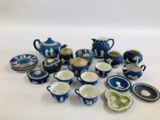 A COLLECTION OF DARK BLUE WEDGWOOD JASPERWARE TO INCLUDE CUPS AND SAUCERS, TRINKETS, DISHES,