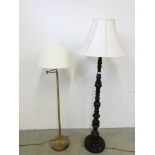 A MAHOGANY TURNED STANDARD ROOM LAMP ALONG WITH A MODERN BRASS FINISH LAMP - SOLD AS SEEN.