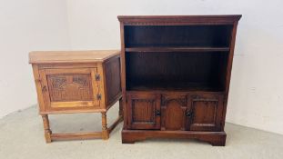 A SOLID OAK SINGLE DOOR CARVED DETAIL CABINET,