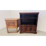 A SOLID OAK SINGLE DOOR CARVED DETAIL CABINET,