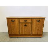 A MODERN 3 DOOR 1 DRAWER SIDEBOARD - 125CM W X 40CM D X 74CM H.