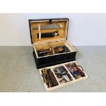 A HAND CRAFTED BLACK PAINTED WOODEN TOOL CHEST CONTAINING A LARGE QUANTITY OF TOOLS TO INCLUDE